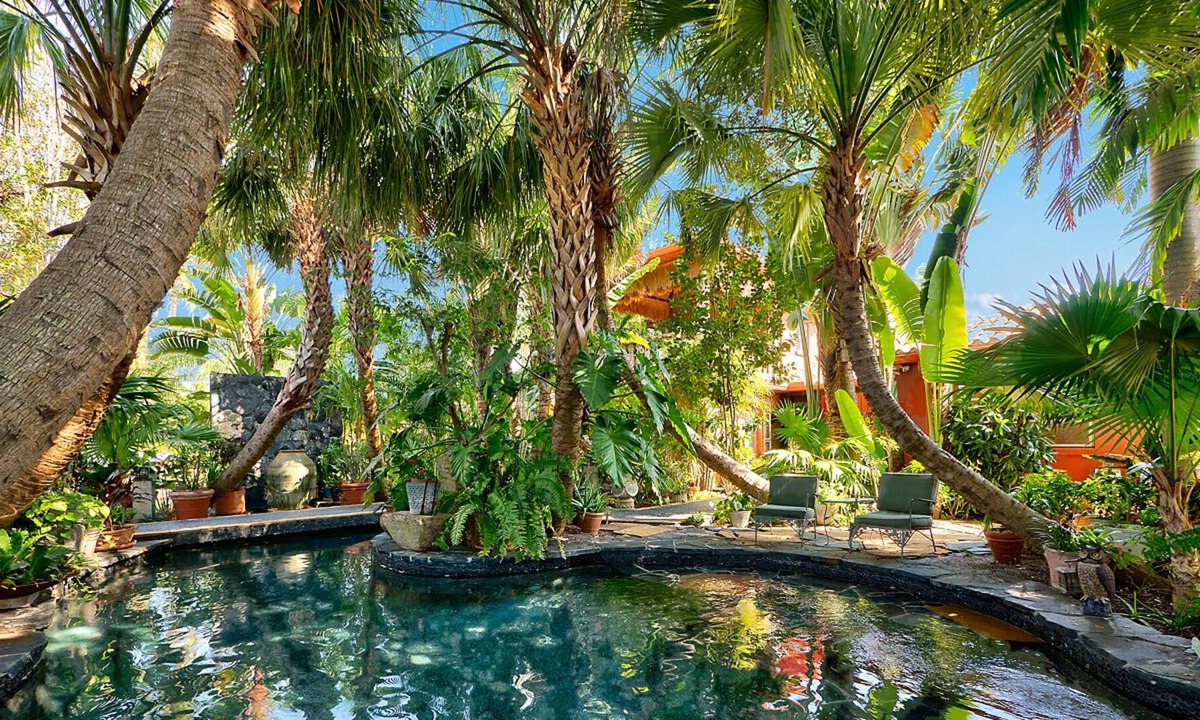 Parrot Cove House | Bali Inspired Home on Golf Course- 4 Bedroom + Heated Lagoon Pool!