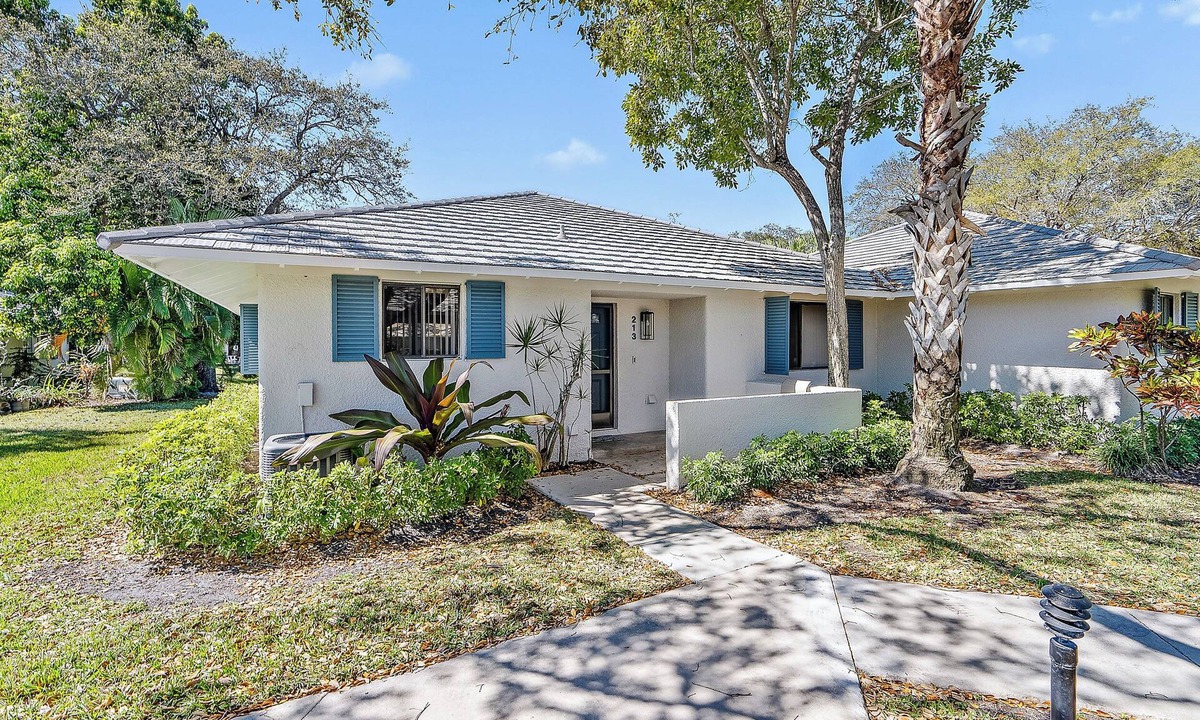 Hunt Club Cottage | Beautifully updated, end unit, waterfront club cottage. 2BR 2BA + Pool and More!