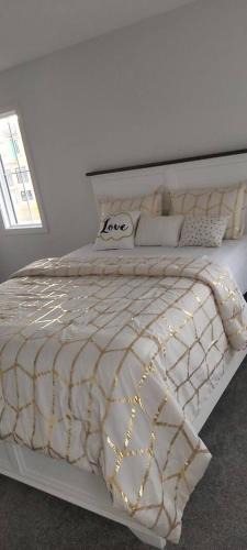 Southwest Edmonton House | Bedroom with private bathroom in Southwest