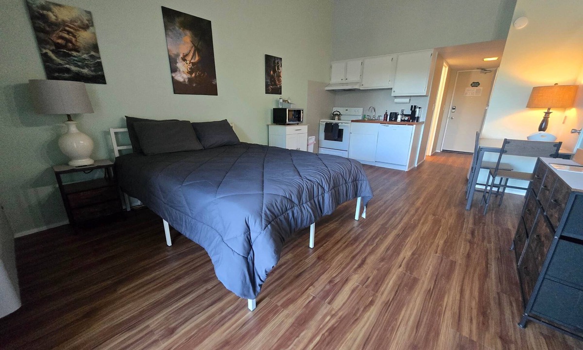 Weirs Beach Apartment | Cedar Lodge Condo Balcony and Full Kitchen