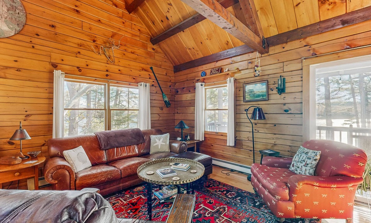 Wiscasset House | Charming riverfront home with cozy interiors, dock, and scenic deck views