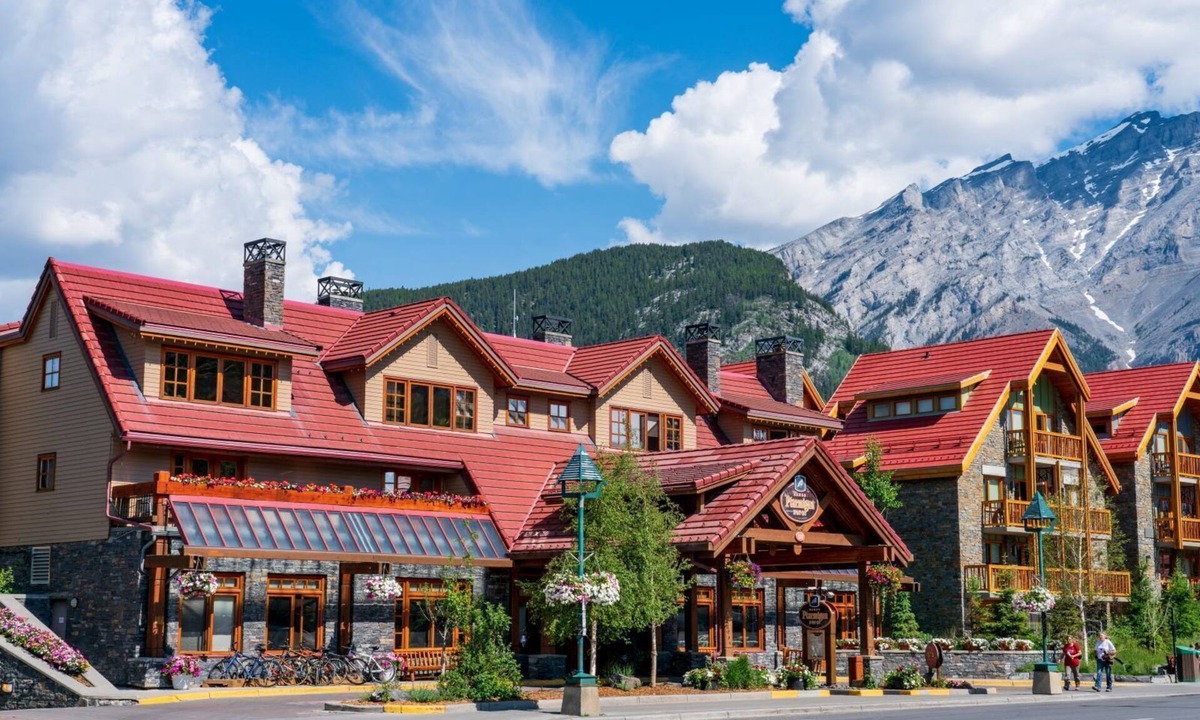 Banff Apartment | Chic King Room w/Balcony | Sauna & Hot Tub Access