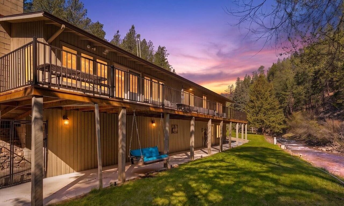 Rapid City House | Creekside Retreat | Fireplace + Gameroom