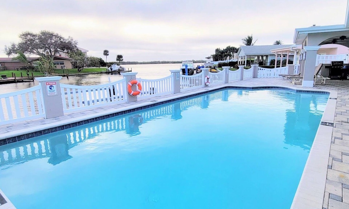 Cocoa Isles House | "Dive Into Fun! Spring & Summer Deals at Dolphin Cove – Walk to It All!"