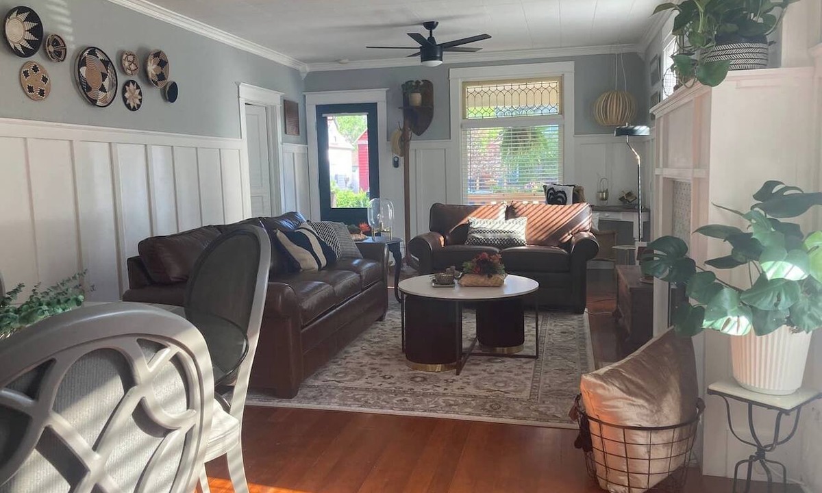 Sheridan Cottage | Escape to this stylish, centrally-located, updated home, perfect for families or groups. Featuring a modern kitchen, private fenced backyard with a gas fire column, and flexible sleeping arrangements for up to 6 guests.