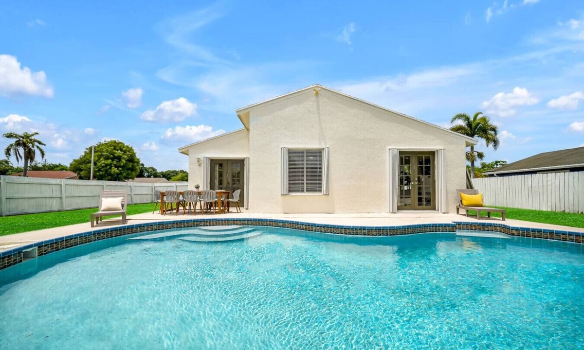 Royal Palm Beach House | Family Friendly 4BR Home with a Private Pool & Calm Farmhouse Charm