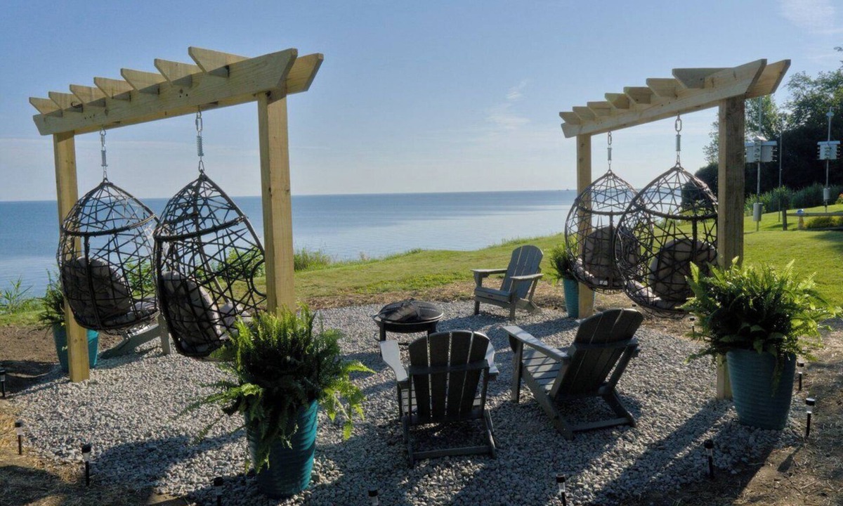 Ashtabula House | Luxury Lakefront Retreat: Panoramic Views, Game Room, Fire Pit Swings & More