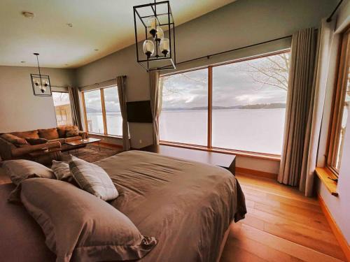 Newport Center Apartment | Luxury Waterfront Escape - Private Firepit & Dock on Lake Memphremagog
