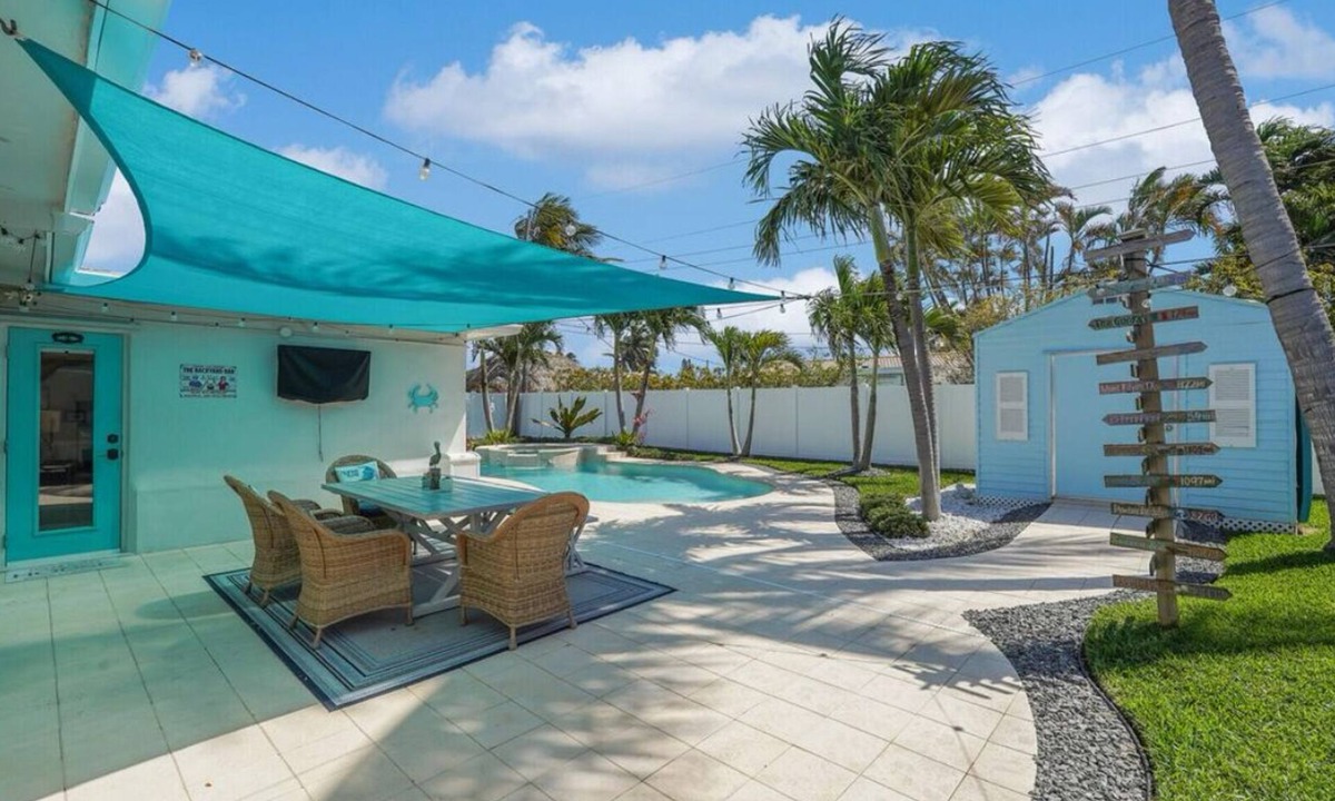 Lighthouse Point House | Pet friendly house with a heated pool and hot tub!