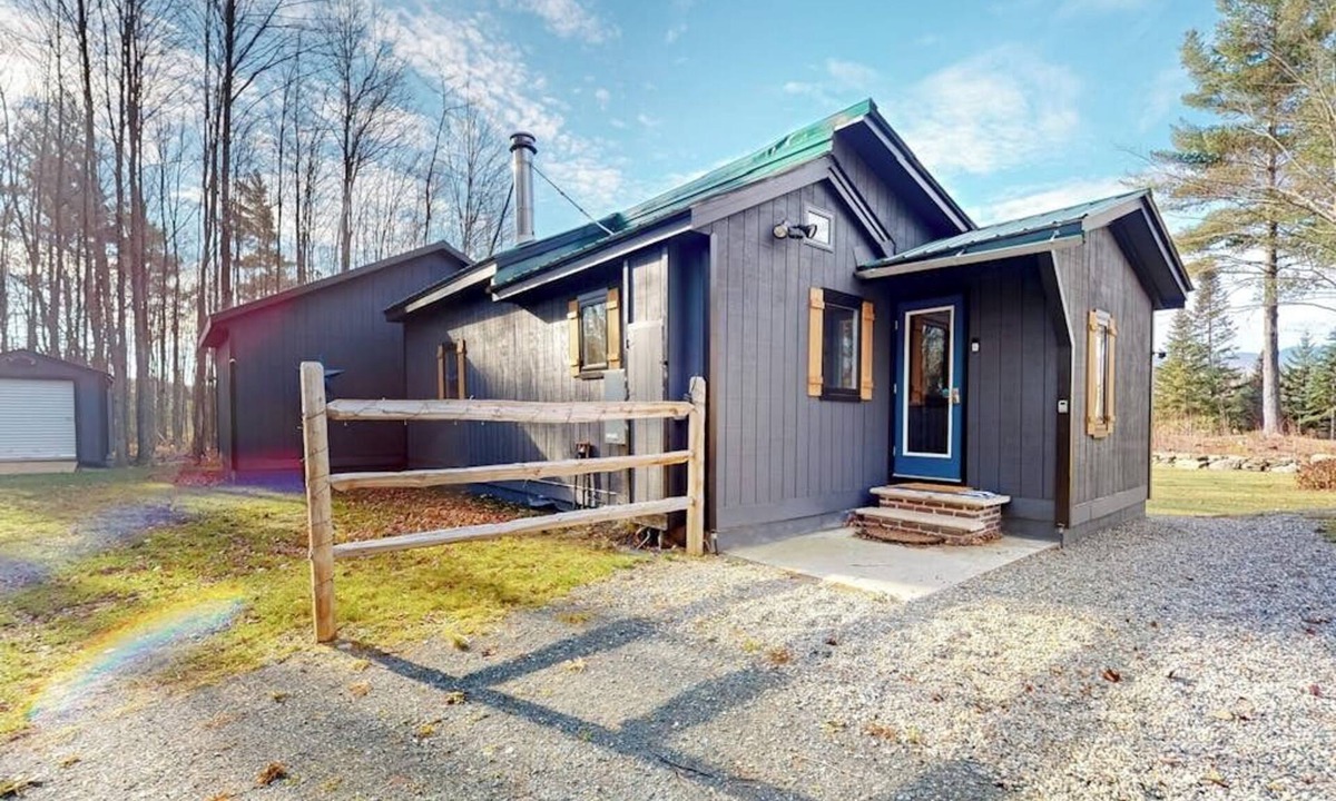 North Troy Cabin | Renovated historic cabin with mountain views, lake access, & electric fireplace