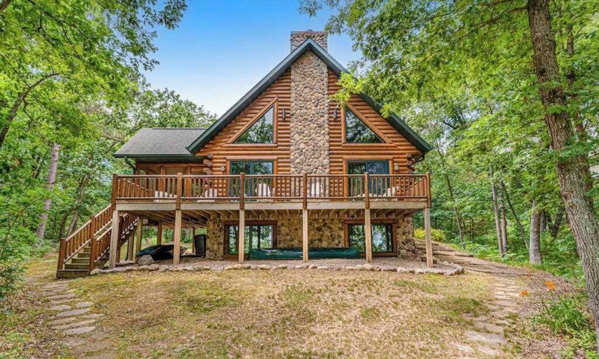 Lyndon Station House | Riverfront cabin with a dock, kayaks and a canoe - firepit and water views