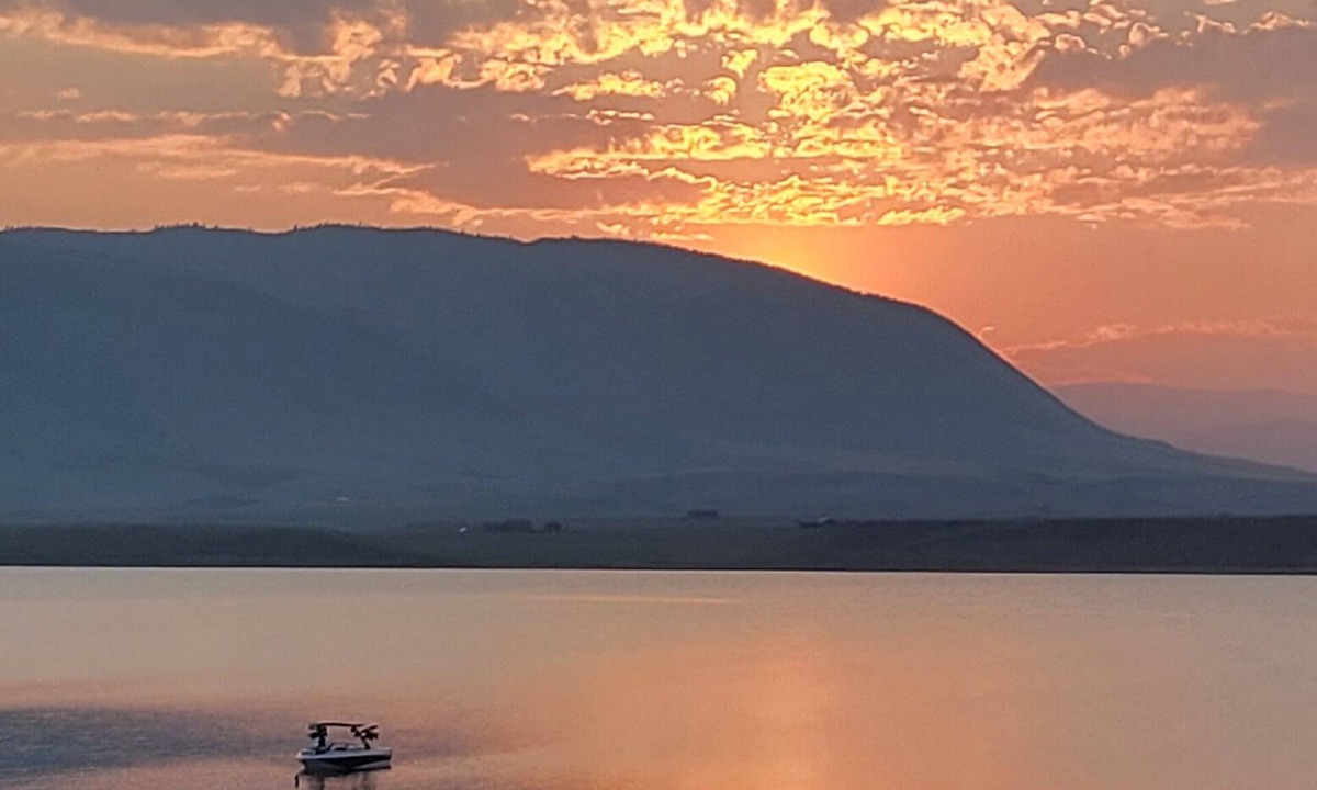 Laramie Cottage | Rustic Wyoming Lake Cottage with Mountains Views.