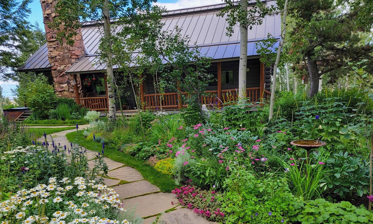 Jackson House | Secluded mountain-view home with large deck, hot tub & fireplace - dog-friendly