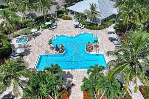 Naples Apartment | Spacious 2BR Lely Resort Condo with Lake View steps to Pool Hot Tub Gym