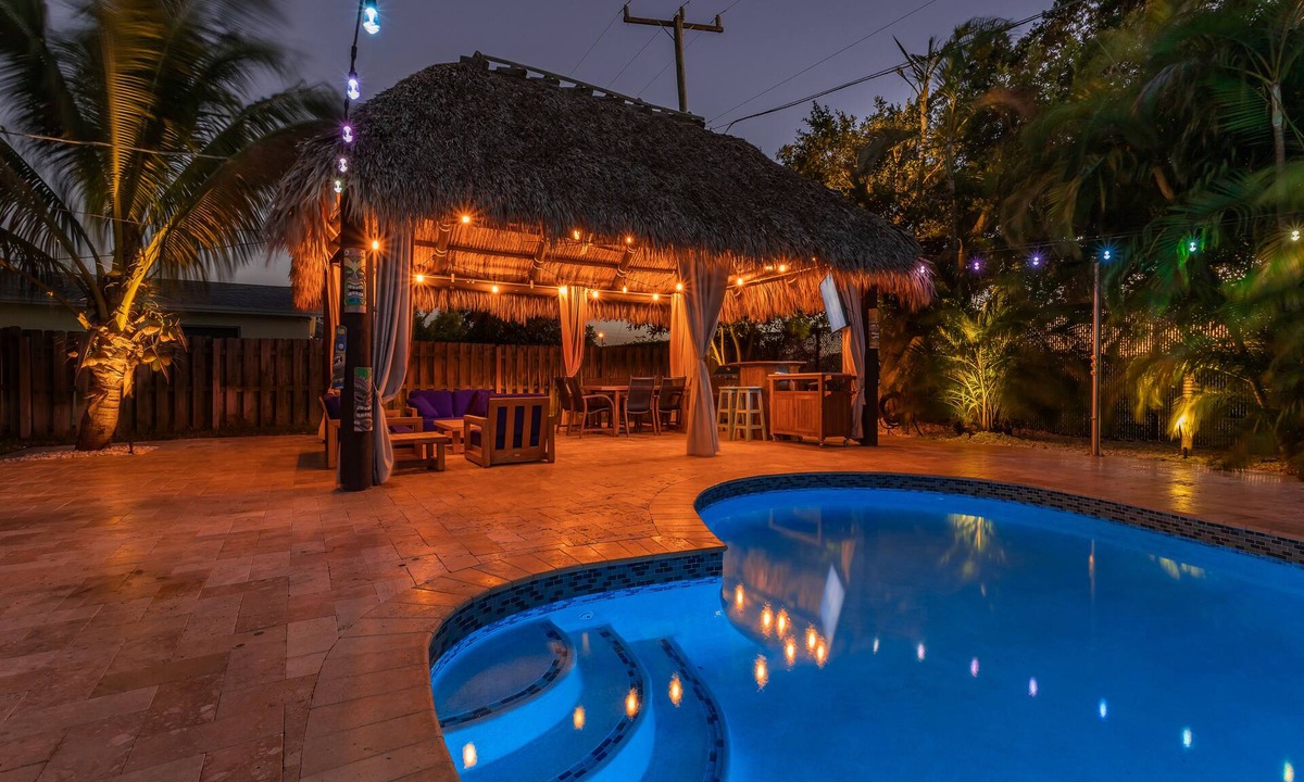 Echo Lake House | Tiki Paradise Oasis Home + Pool, Tiki Hut & 10 Min to Beach! New Outdoor Kitchen