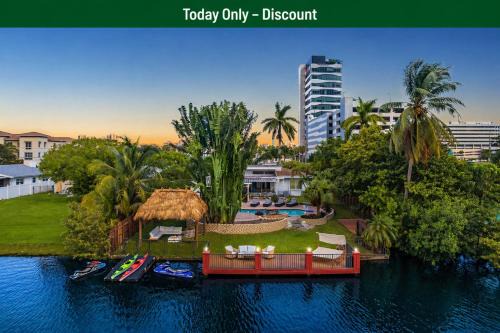 Ojus House | Waterfront Jungle House Firepit Sunset and more
