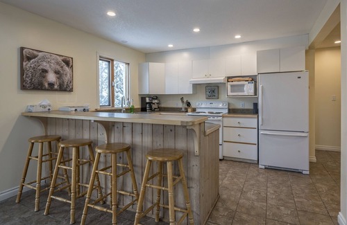 Silver Star Mountain House | Amazing location with private hot tub, sauna, laundry and ground level suite.