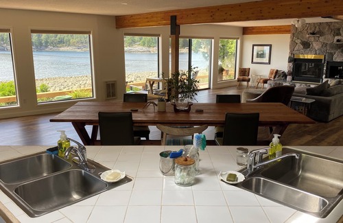 Stillwater House | Amazing Waterfront Retreat with two private decks, steps to beach