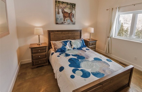 East Kootenay House | Riverfront! Private hot tub and mountain views! Close to the ski hill & town!