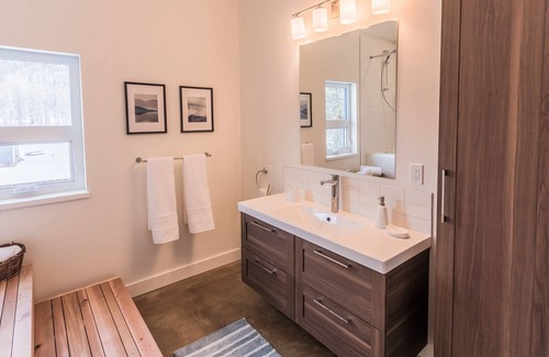 East Kootenay House | Riverfront! Private hot tub and mountain views! Close to the ski hill & town!