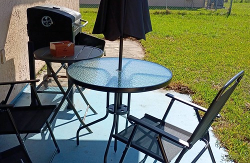 Florida Ridge House | 10 min from Beach Cozy style home your get away tropical stay.