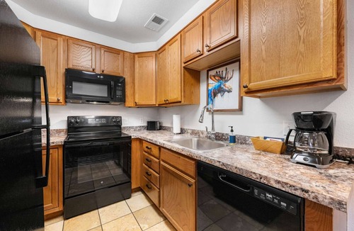 Estes Park Apartment | 2BR Riverside Condo - Pool, Hot Tub, Game Room