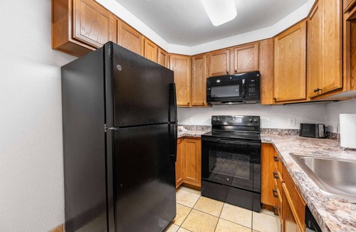 Estes Park Apartment | 3BR Riverside Condo - Pool, Hot Tub, Game Room