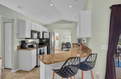Florida Ridge House | 4/2 Home with Enclosed Heated Saltwater Pool