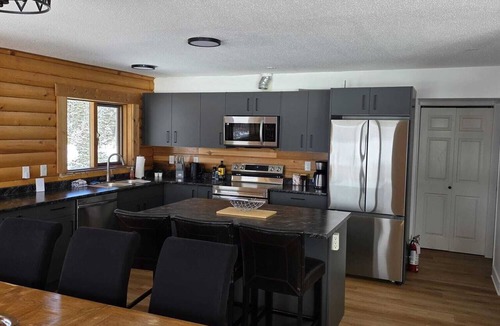 Central Okanagan Cabin | 4 Bdrm Lodge Suite w Hot Tub, beautiful Lake views! Pet Friendly