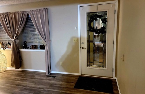 Rock Springs House | 4 Bed 2 Bath Home. Great area. Yard and sun porch. Close to Shopping and park.