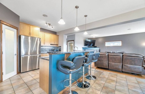 Chestermere House | 5BR Gem w/Pizza Oven, Theater & Views