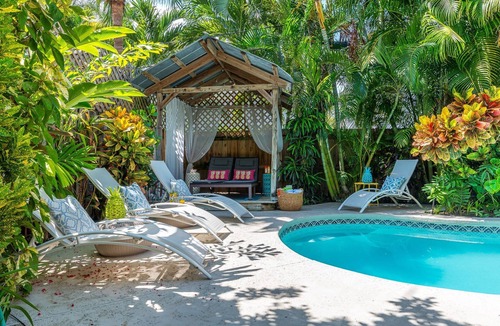 Grandview Heights House | A Contemporary & Classic Gem in Historic El Cid w/guest cottage & tropical pool