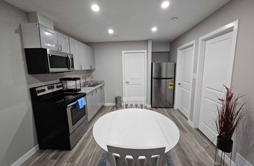 Regina House | A Fully furnished basement suite with separate entrance.