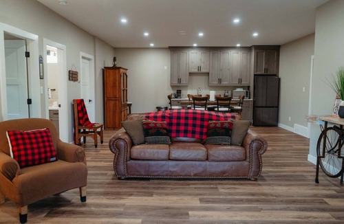 Eagle Bay House | A relaxing lake view at Eagle Bay Manor suite and hot tub