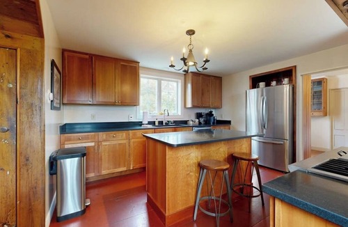 Boothbay Harbor House | All-suite Boothbay Harbor home with deck, ocean views, and fireplaces