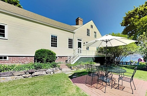 Boothbay Harbor House | All-suite Boothbay Harbor home with deck, ocean views, and fireplaces