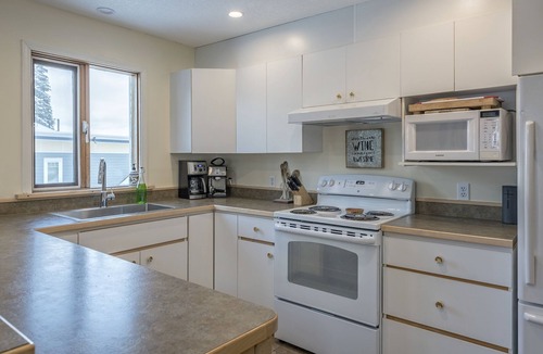 Silver Star Mountain House | Amazing location with private hot tub, sauna, laundry and ground level suite.