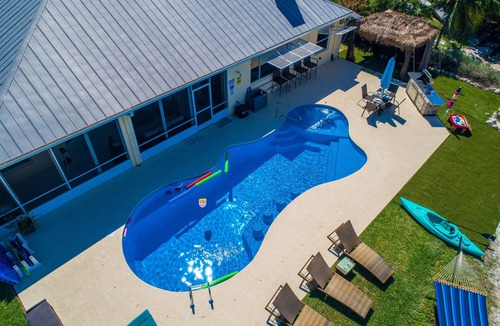 Stuart House | Aquatopia Resort: SideBySide Riverfront, steps2ocean, Pools/Docks/HotTubs & More