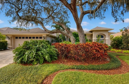 Boyette Springs House | Backyard oasis w/pool, sauna & fire pit