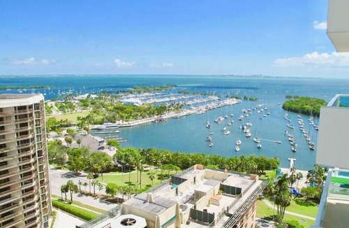 Coconut Grove Condo | Balcony Ocean Views | Pool, Gym, Wi-Fi & Parking