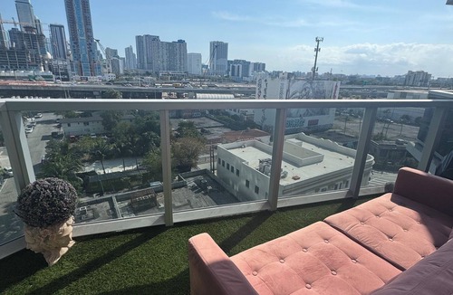 Town Square Condo | BarB&B A Pink Paradise Awaits