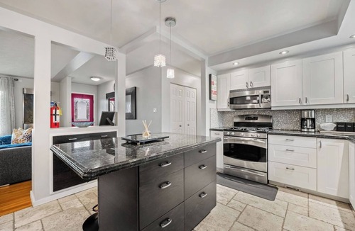 Southeast Calgary House | Bark + Bloom Bungalow | Fenced Yard | Pet Friendly