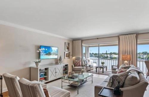 Moorings Apartment | Bayfront Condo with Screened Lanai and Beach Acces