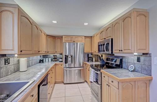 North Palm Beach House | Beach, Heated Pool, Tiki Lounge Tradewind Home