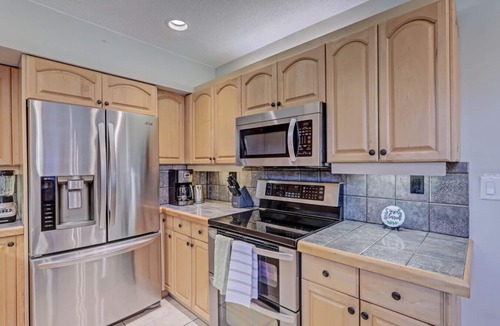 North Palm Beach House | Beach, Heated Pool, Tiki Lounge Tradewind Home