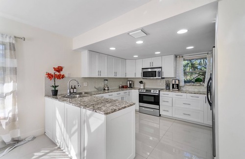Singer Island House | Beach Lux Heated Pool w/Infinity Spa, Cabana, BBQ, Golden Tee Walk to Beach