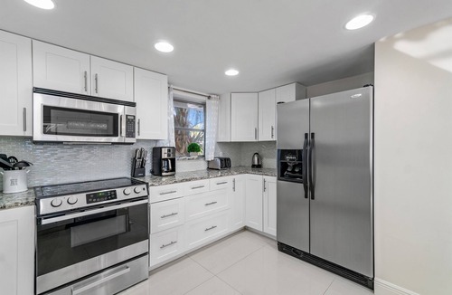 Singer Island House | Beach Lux Heated Pool w/Infinity Spa, Cabana, BBQ, Golden Tee Walk to Beach