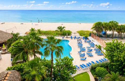 Galt Mile House | Beachfront Condo with Pool, Balcony & Ocean Views