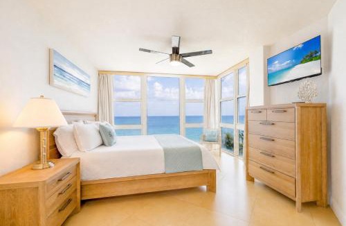 Galt Mile House | Beachfront Condo with Pool, Balcony & Ocean Views