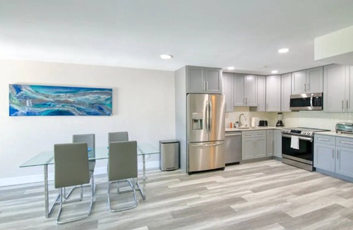 Palm Beach Shores Condo | Beachside Retreat | Hot Tub + Fire Pit + WiFi